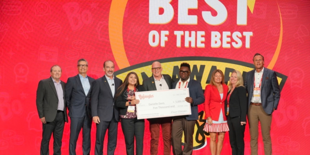 Danielle “Dani” Davis and the Bo Flavor Bojangles team receiving the Best of the Best award, recognizing their achievement among more than 900 Bojangles stores nationwide.